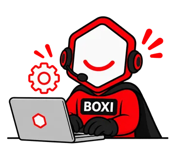 Boxi pracuje przy laptopie